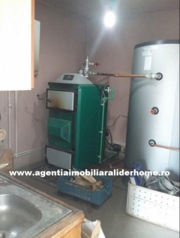 casa-spatioasa-cu-teren-tulbureni-17