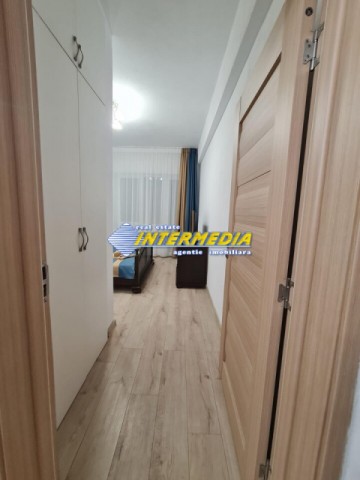 apartament-la-vila-de-inchiriat-cu-4-camere-baie-bucatarie-loc-parcare-garaj-utilat-si-mobilat-complet-10
