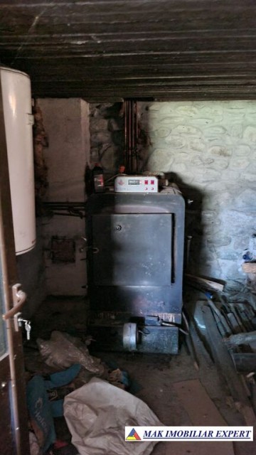 vila-spatioasa-cu-4-camere-de-vanzare-si-teren-de-5000-mp-in-stoenesti-arges-27